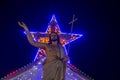 Merry Christmas - statue of Jesus with star Royalty Free Stock Photo