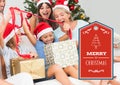 Merry Christmas text with family opening presents Royalty Free Stock Photo