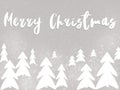 Merry Christmas text, handwritten sign on stylish simple christmas trees and snow on grey background. Hand drawn illustration. Mo