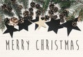 Merry Christmas text on modern christmas flat lay with green fir Royalty Free Stock Photo