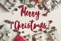 Merry christmas text, seasonal greetings card sign. flat lay. pr Royalty Free Stock Photo