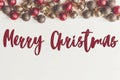 Merry christmas text, seasonal greetings card sign. flat lay. re Royalty Free Stock Photo