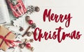 Merry christmas text, seasonal greetings card sign. flat lay. w Royalty Free Stock Photo