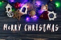 Merry christmas text sign on garland lights border ang golden t Royalty Free Stock Photo