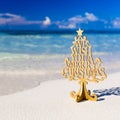 Merry Christmas text on the tropical beach Royalty Free Stock Photo