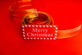 Merry Christmas text wooden sign, decorations and ornaments in a colorful Christmas composition Royalty Free Stock Photo