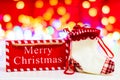 Merry Christmas text wooden sign, decorations and ornaments in a colorful Christmas composition Royalty Free Stock Photo