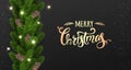 Merry Christmas Typographical on black background with garland of tree branches decorated with stars, lights, snowflakes. Royalty Free Stock Photo