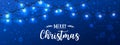 Merry Christmas Typographical on blue background with Xmas decorations glowing white garlands, light, stars