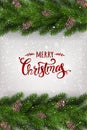 Merry Christmas Typographical on white background with garland of tree branches decorated with stars, lights, snowflakes. Royalty Free Stock Photo