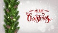 Merry Christmas Typographical on white background with garland of tree branches decorated with stars, lights, snowflakes. Royalty Free Stock Photo