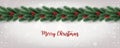 Merry Christmas Typographical on white background with tree branches decorated with berries, lights, snowflakes. Royalty Free Stock Photo