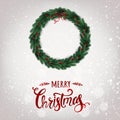 Merry Christmas Typographical on white background with Christmas wreath of tree branches, berries, lights, snowflakes. Royalty Free Stock Photo