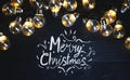 Merry Christmas Typography Light Bulbs on Black Wood Royalty Free Stock Photo