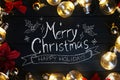 Merry Christmas Typography Light Bulbs and Red Poinsettia on Black Wood. Royalty Free Stock Photo