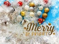 White snowflakes and red gold white Christmas tree balls on blue background Greetings Card holiday wishes quotes red  white gold t Royalty Free Stock Photo