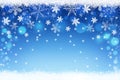 Merry Christmas. Winter background with blue bokeh and snowflakes Royalty Free Stock Photo
