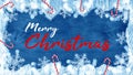 Merry Christmas / winter background template - Frame made of snow with snowflakes bokeh lights, candy canes and ice crystals on Royalty Free Stock Photo