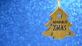 Merry Christmas or winter holidays concept.Wooden christmas tree on gllitter blue background for design with copy space. Royalty Free Stock Photo