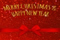 Merry Christmas word on red glitter texture abstract background