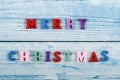 MERRY CHRISTMAS word on wooden background composed from colorful abc alphabet block wooden letters. Royalty Free Stock Photo