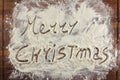 Merry christmas written with flour Royalty Free Stock Photo