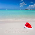 Merry Christmas written on tropical beach white Royalty Free Stock Photo