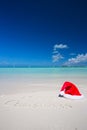 Merry Christmas written on tropical beach white Royalty Free Stock Photo