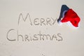 Merry Christmas written on tropical beach white Royalty Free Stock Photo