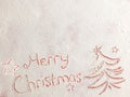 Merry Christmas written on white snow Royalty Free Stock Photo