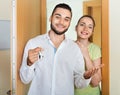 Merry couple coming to the apartment Royalty Free Stock Photo