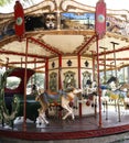 Merry-go-round. Carousel. Playground. Traditional game for children. Amusement park. A merry-go-round with horses, reindeer and sl