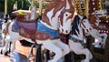 Merry Go Round horse riding at a fairground. Royalty Free Stock Photo