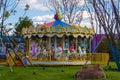 A merry-go-round playground in a park Royalty Free Stock Photo