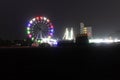 merry go round swing at night with colorful light at city fair ground from different angle Royalty Free Stock Photo