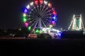 merry go round swing at night with colorful light at city fair ground from different angle Royalty Free Stock Photo