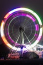 merry go round swing at night with colorful light at city fair ground and long exposure motion burr Royalty Free Stock Photo