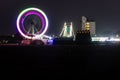 merry go round swing at night with colorful light at city fair ground and long exposure motion burr Royalty Free Stock Photo