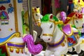 Merry o round colorful carousel horses for little baby kids Royalty Free Stock Photo