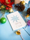 Merry x`mas card with christmas decoration items. Royalty Free Stock Photo