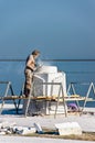 Mersin, Mezitli / Turkey - 11 15 2010: Unknown sculptor carves sculpture from white marble with grinding tool.