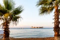 Mersin, Turkey - August 16, 2019: Maiden`s castle, Kiz Kalesi with palm in Mediterranean Sea. Mersin Turkey Royalty Free Stock Photo