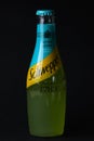 Mersin, Turkey - February 2020. Chilled bitter lemon Schweppes bottle with drops and inscriptions on Turkish at black