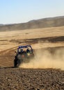 Merzouga, Morocco - Feb 25, 2016: Blue Polaris RZR 800 in Morocco desert near Merzouga. Merzouga is a small village located in the