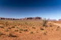 Mesa, Buttes and vegetation Monument Valley Arizona Royalty Free Stock Photo