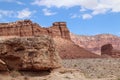 Mesa among rugged layered red rock dramatic desert landscape at the Grand Canyon in Arizona, USA Royalty Free Stock Photo