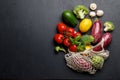 Mesh bag filled with a variety of vegetables