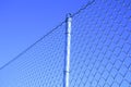 Mesh fence with a post