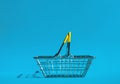 Metal shopping basket. The symbol of retail trade. Royalty Free Stock Photo