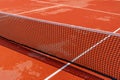 Mesh on the wet tennis court Royalty Free Stock Photo